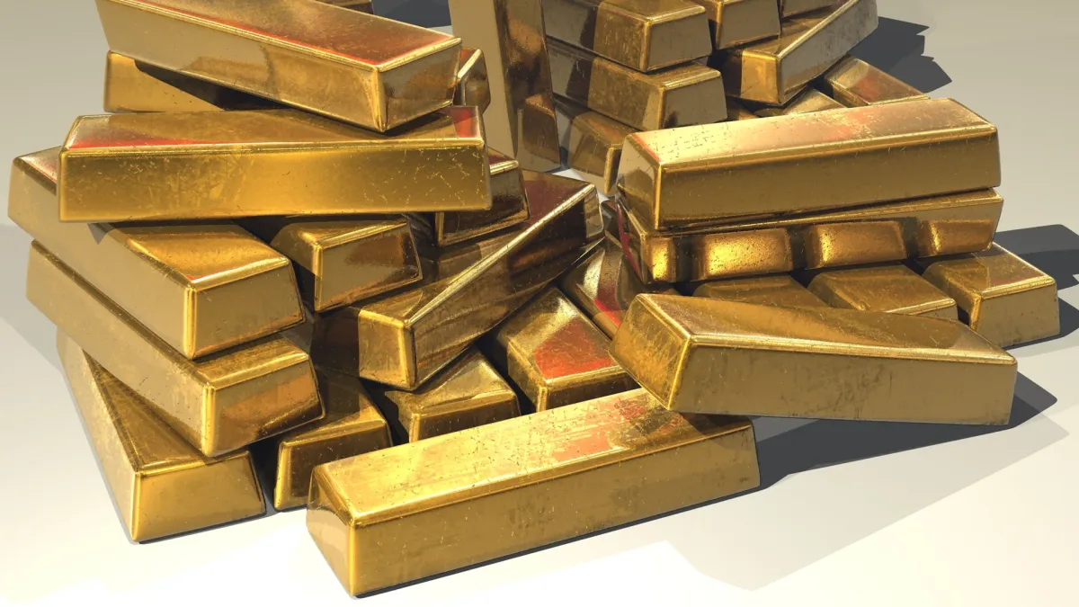 Pile of gleaming gold bars